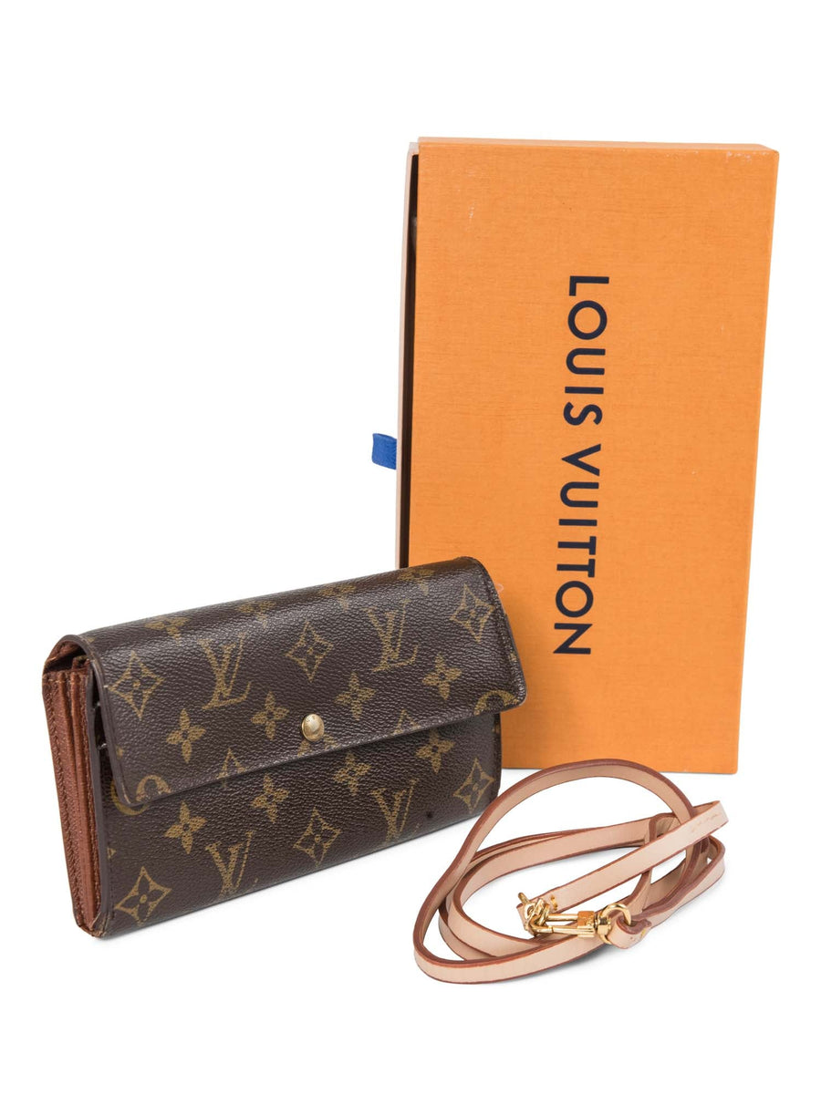 Louis Vuitton Wallet with buckle clasp that has