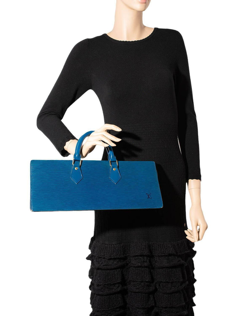 VERIFIED Louis Vuitton Monogram Triangle Sac Bag -  Denmark
