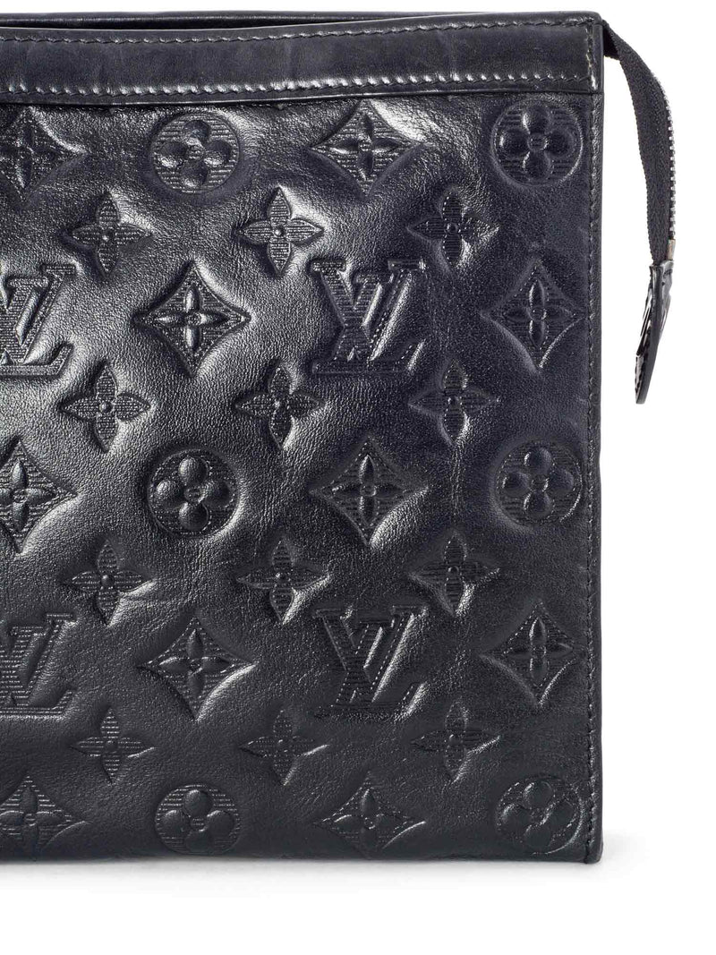 LOUIS VUITTON Black leather flap clutch bag, monogrammed…