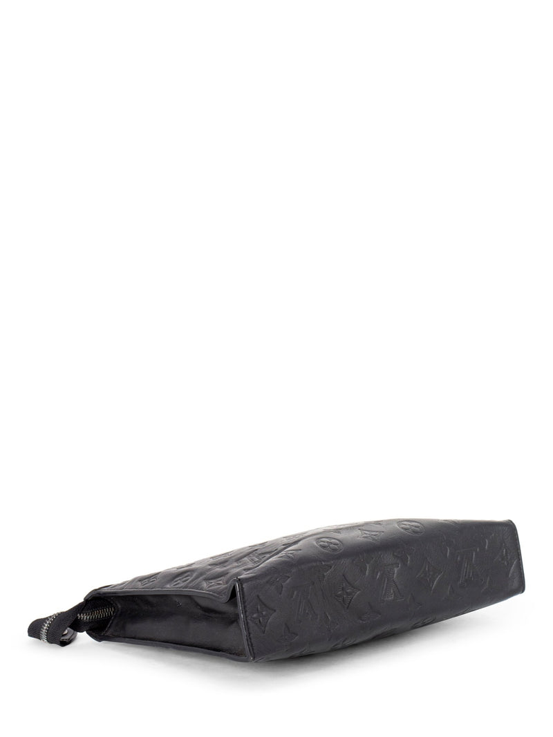 LOUIS VUITTON Black leather flap clutch bag, monogrammed…